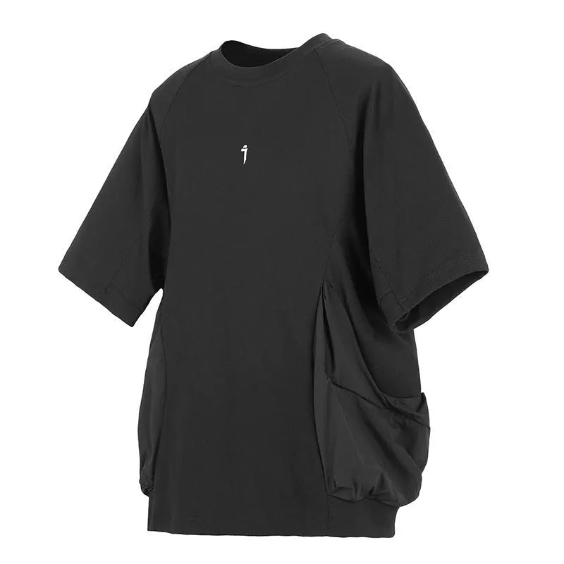 Men's loose grey cotton T-shirt with large front pockets and short sleeves.