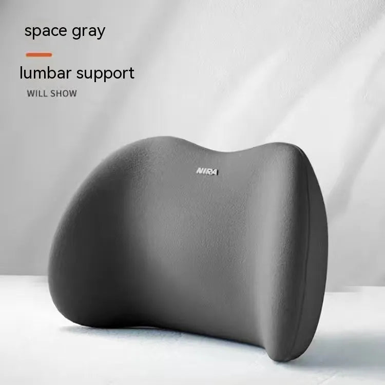 Black memory foam car lumbar support pillow and matching headrest pillow on a car seat.