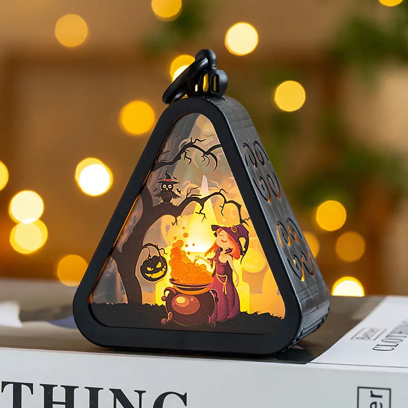 A portable Halloween decoration pumpkin lamp prop in plastic and glass, showing scale against a measuring tape.