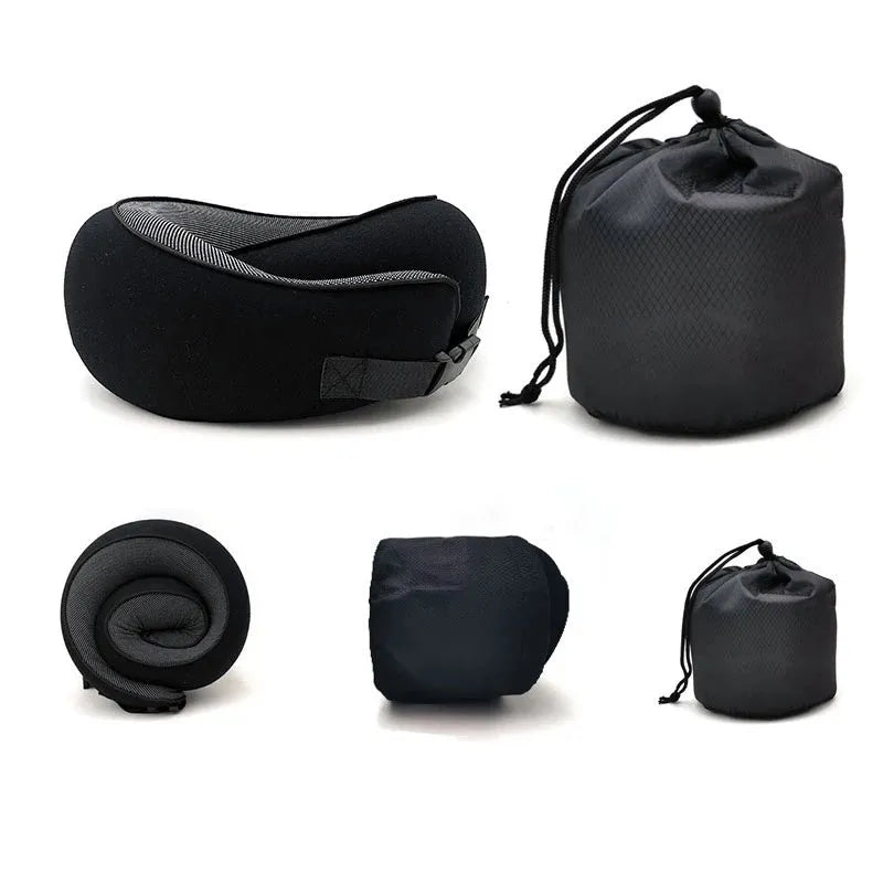 U-shaped memory foam travel neck pillow rolled up next to its carry bag, showing navy blue and grey colour options.