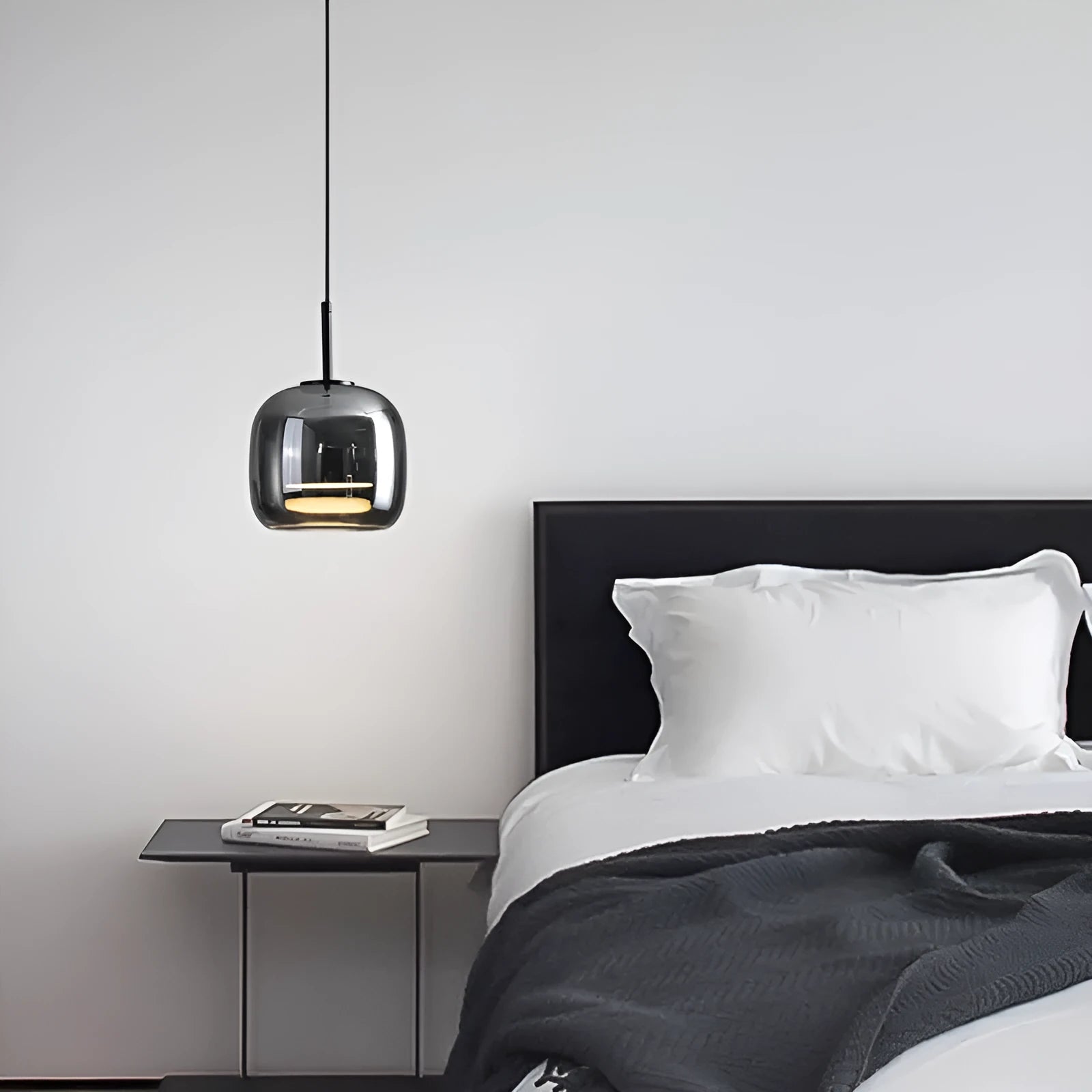 Italian minimalist glass chandelier with tricolor light in a dining room setting