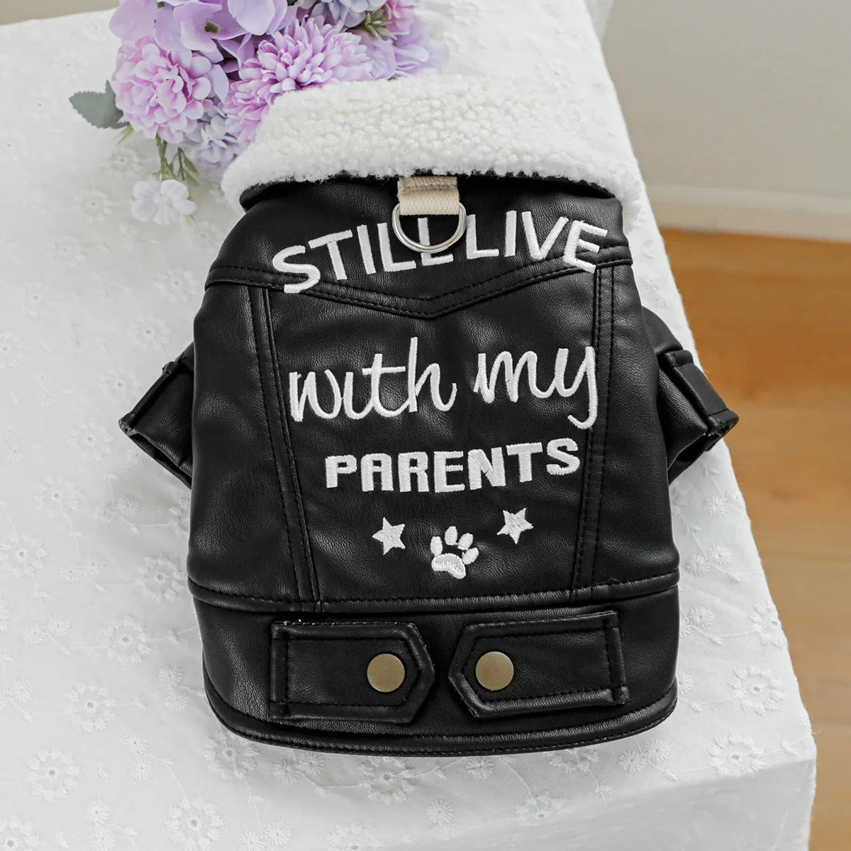 Fleece lined padded dog coat in black colour showing chest measurement and length dimensions