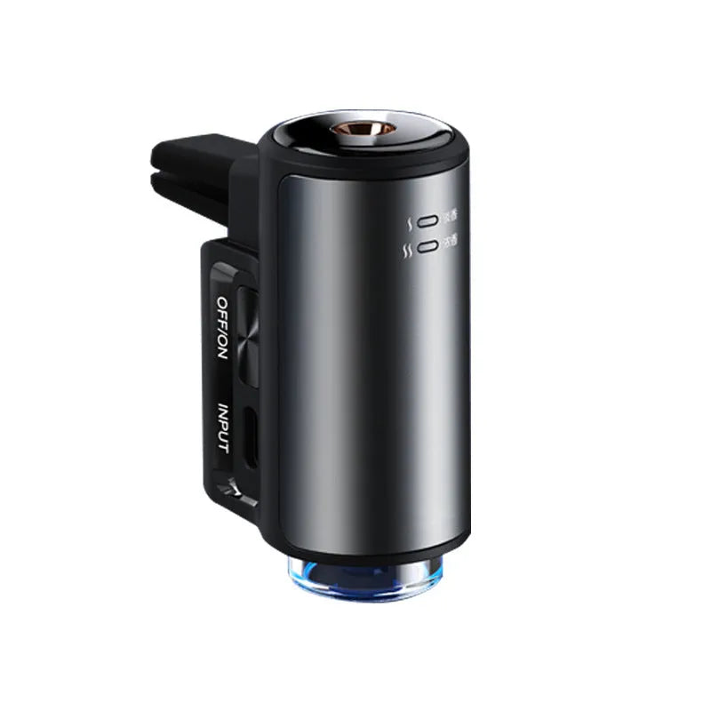 Obsidian black car vent clip aroma diffuser with essential oil bottle on a car air vent