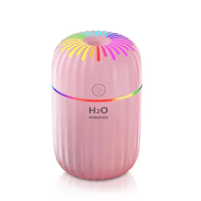 USB mini humidifier with fireworks design in green colour, showing compact 75x75x116mm dimensions