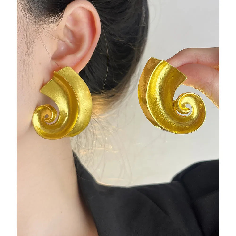 Geometric retro ear studs in alloy with electroplated gold or silver finish measuring 5cm