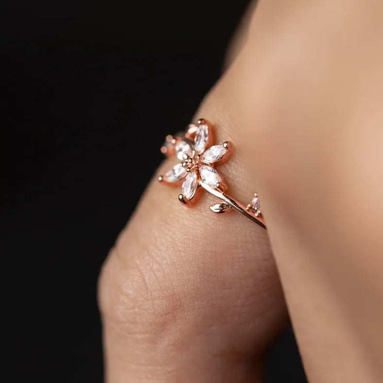 Floral art deco wedding band with diamond gemstone in rose gold setting