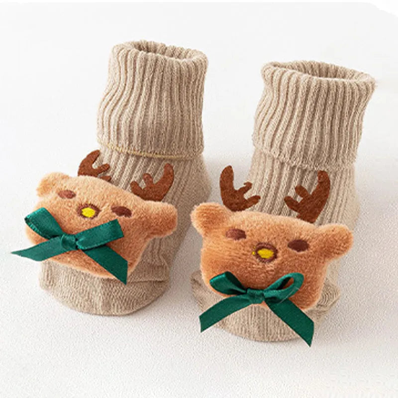 Cotton baby floor socks in multiple designs including panda, bow, and star patterns.
