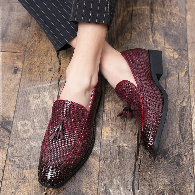 Men's black slip on loafers with pointed toe and tassel detail on PU leather upper