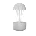 White round plastic USB humidifier with rotating colourful light, single fog outlet, and 0.5-1L water tank