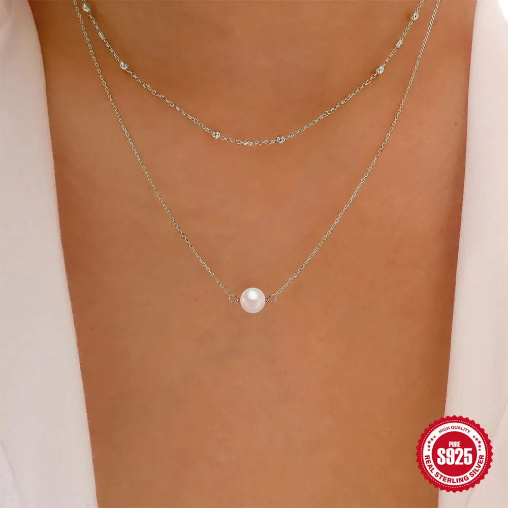 S925 sterling silver women's necklace with double-layer design and twin pearls in gold or white gold plating