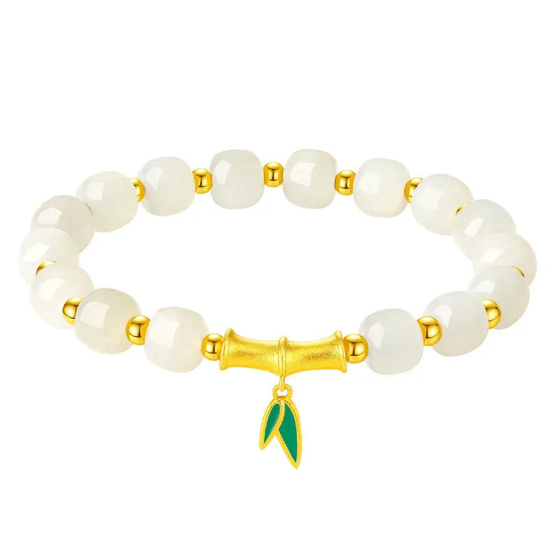 Women's S925 sterling silver and Hetian jade bracelet with bamboo leaf design.