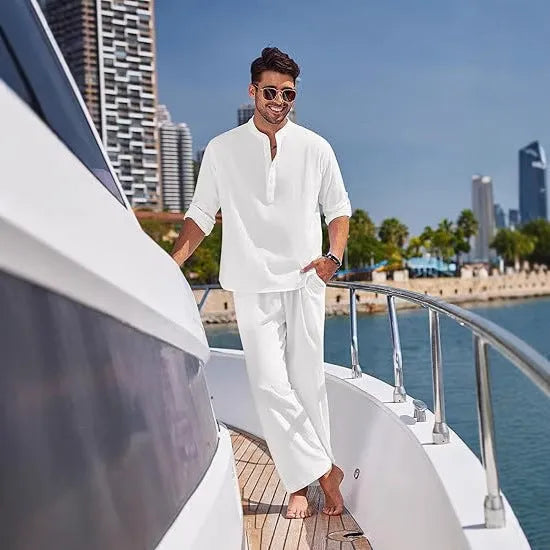 Men's solid colour cotton casual suit with long sleeves and trousers on a hanger.