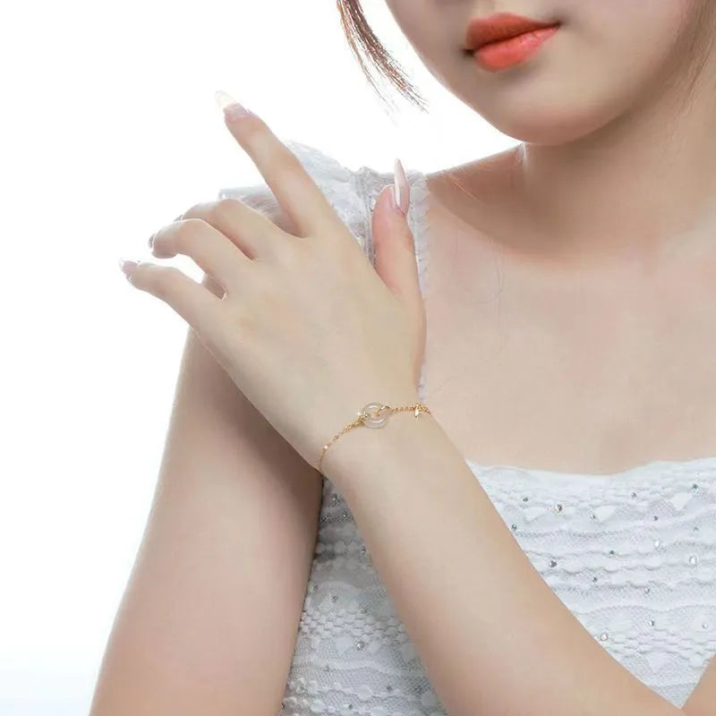 Silver gold bracelet with peace buckle clasp and white chalcedony starry sky design elements
