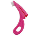Red and white finger sleeve pet toothbrush with silicone bristles for cleaning dog and cat teeth.