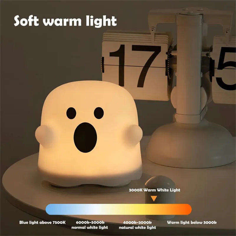 White silicone bedside night light with touch sensor base on wooden table