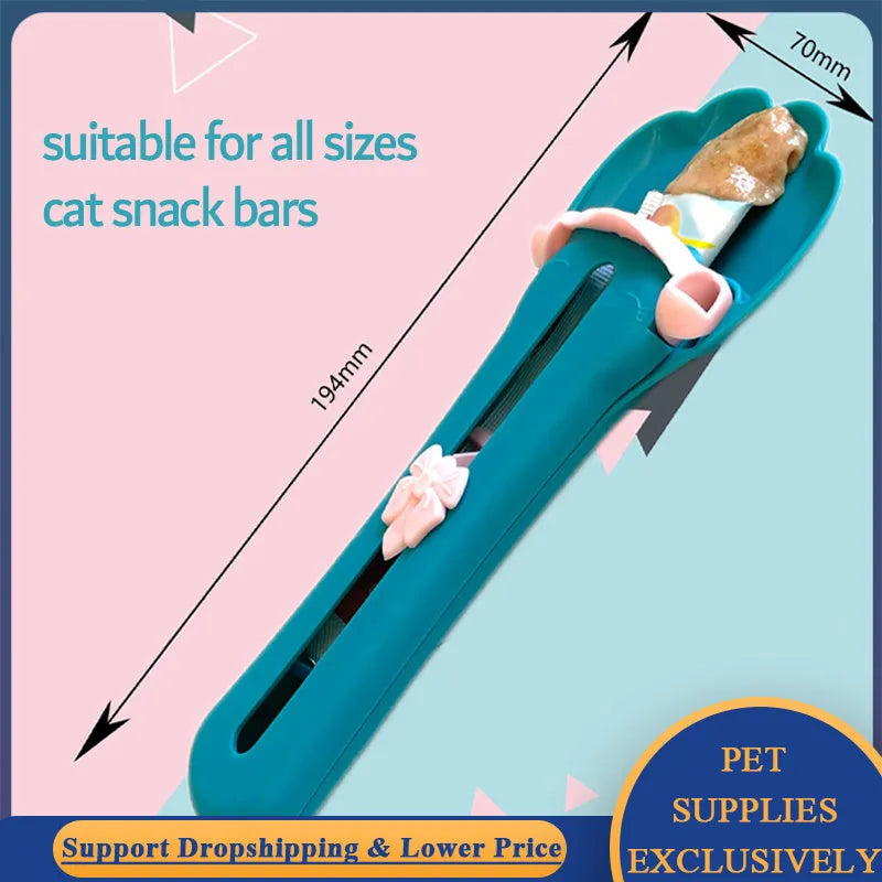 Green and pink pet feed spoon for snack extrusion and cereal dispensing with squeezer feeder design