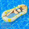 Inflatable floating row in sequined gradient colours on water, with canopy and mesh deck chair