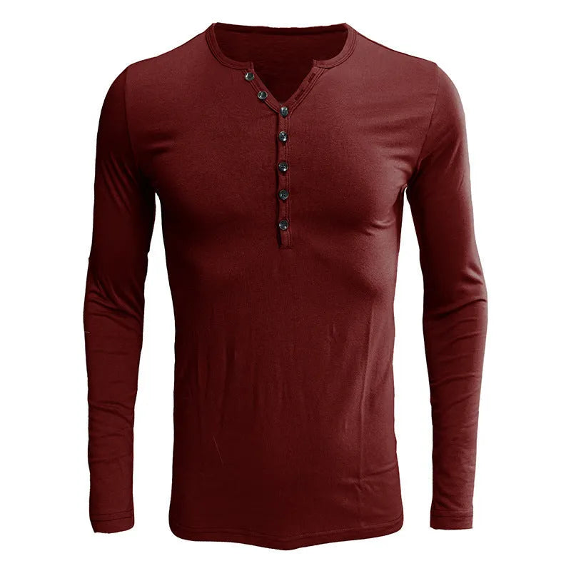 Men's solid blue long sleeved cotton blend t-shirt with a Henry neck, laid flat.