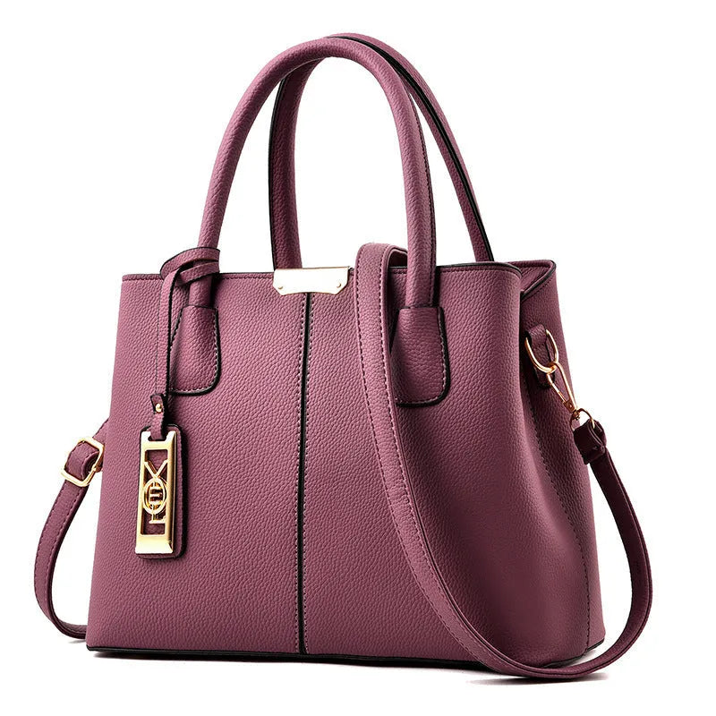 Women's large capacity shoulder bag in soft PU leather with adjustable strap and multiple colour options