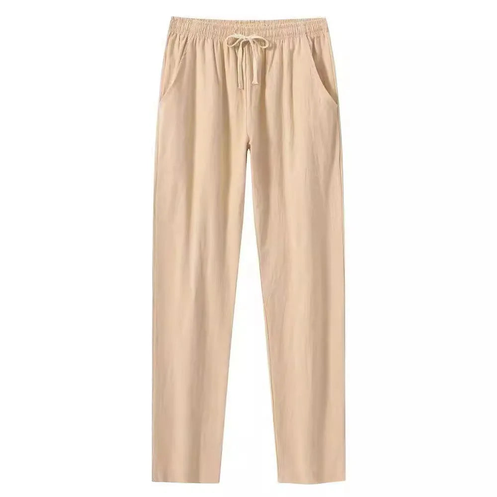 Men's loose-fit cotton beach trousers in solid white, sky blue, khaki, or black colours.