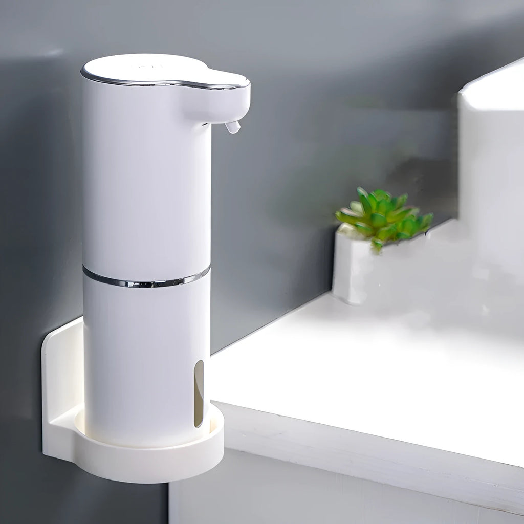 White automatic sensor soap dispenser with ABS body and USB cable on countertop