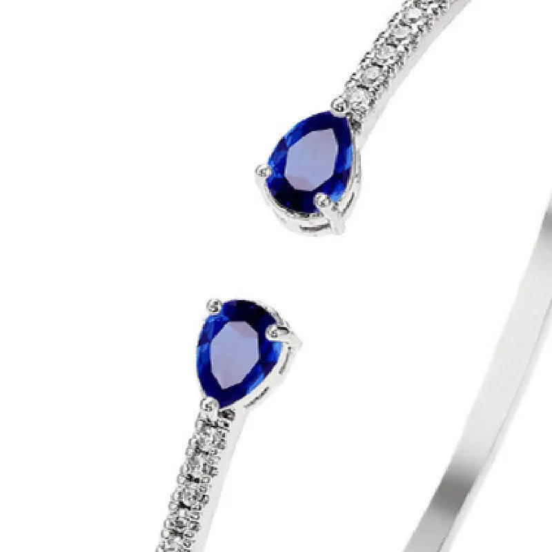 Copper personalised bracelet with multi-zircon inlay detail in white or blue colour
