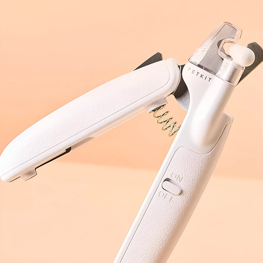 White LED pet nail clipper for cats and dogs with transparent anti-splash guard and file.
