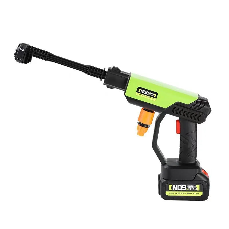 Green wireless high-pressure water gun with metal nozzle, foam pot, extension rods, and battery charger on a grey background