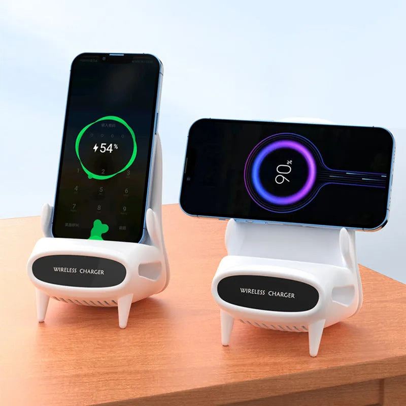 White chair-shaped wireless charging phone stand charging a smartphone on a desk