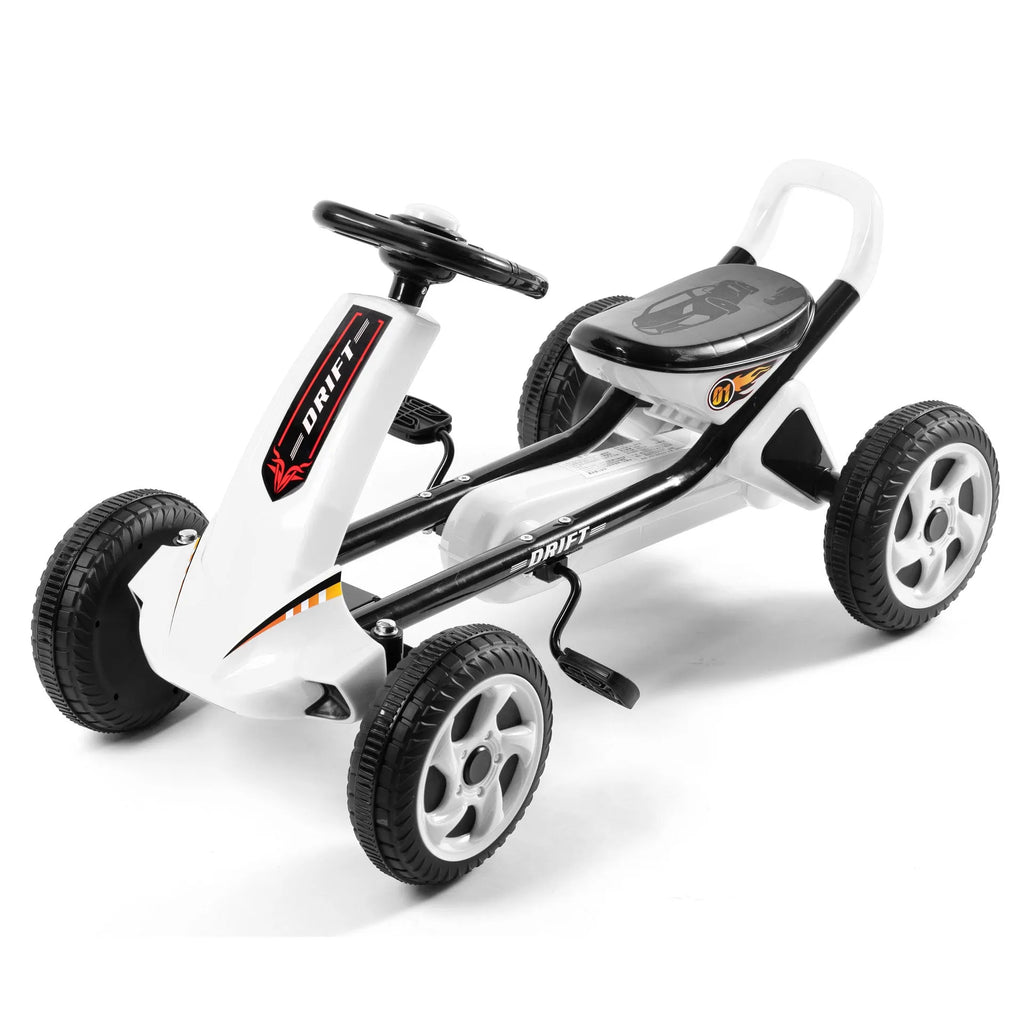Red metal children's pedal karting four-wheel bike on outdoor surface