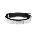 A velvet cat collar with rhinestone decoration, shown in an adjustable length from 20 to 30cm.