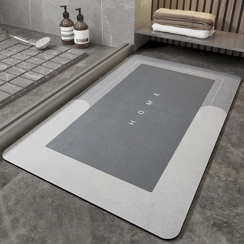 Blended fabric bathroom floor mat in blue, available in oval and rectangular shapes.