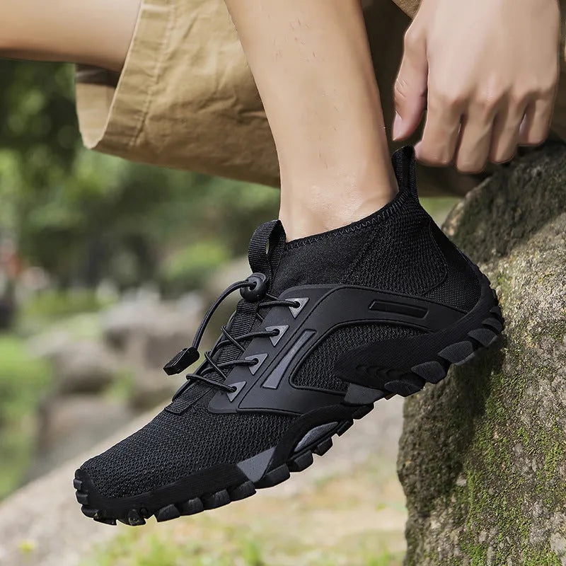 Men's non-slip hiking shoes with fly woven upper and rubber sole, mid-top style in black