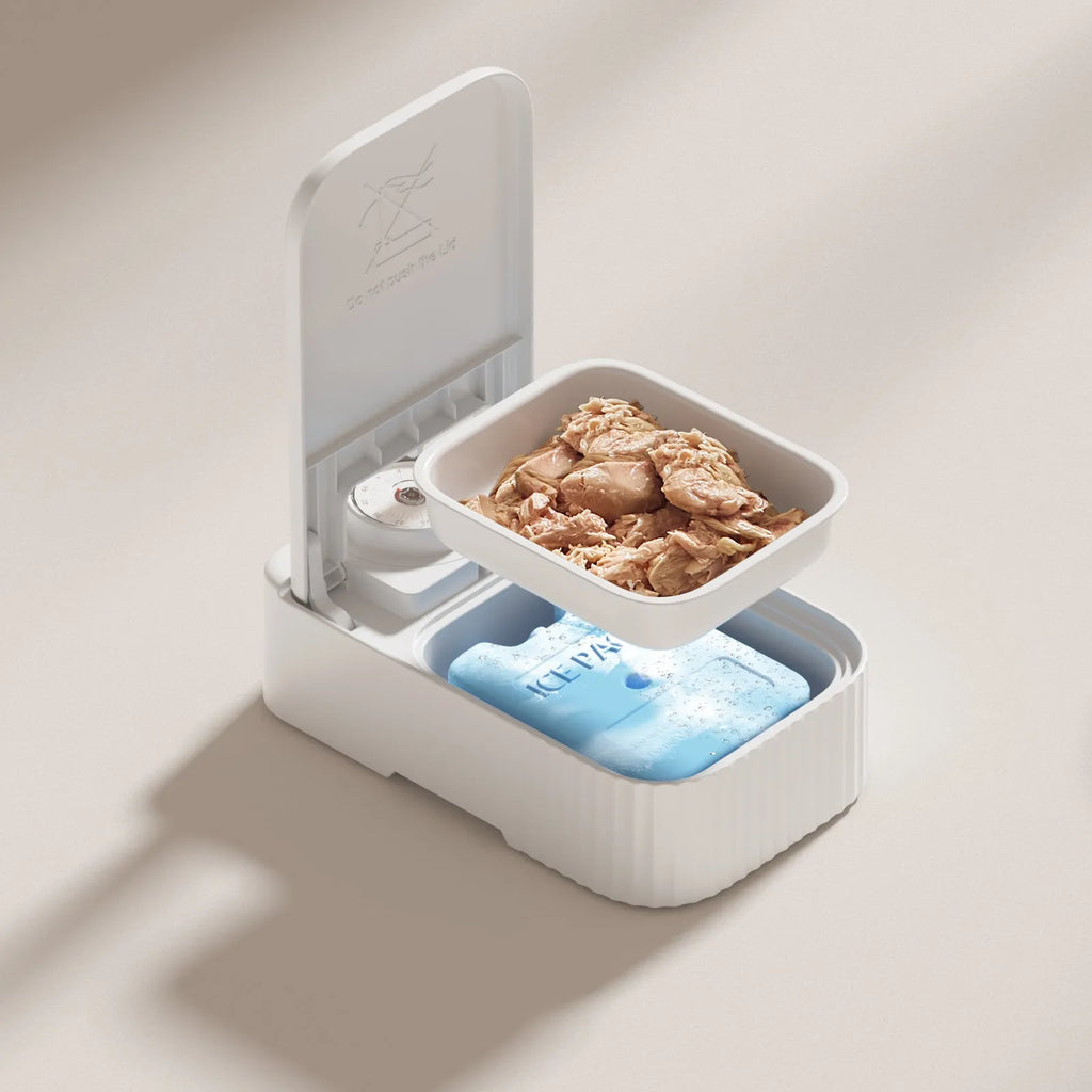 White timed pet feeder with visual alarm display and separate ice crystal box for freshness.