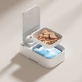 White timed pet feeder with visual alarm display and separate ice crystal box for freshness.