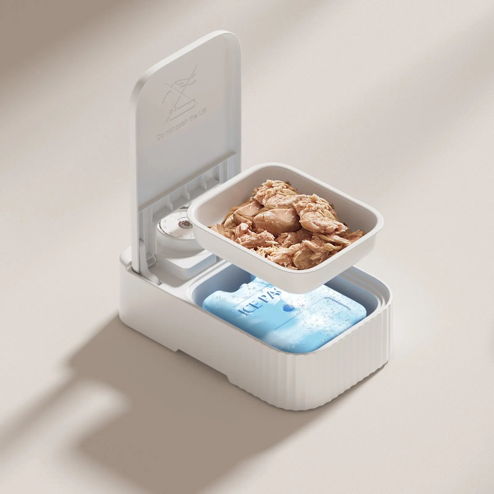 White timed pet feeder with visual alarm display and separate ice crystal box for freshness.