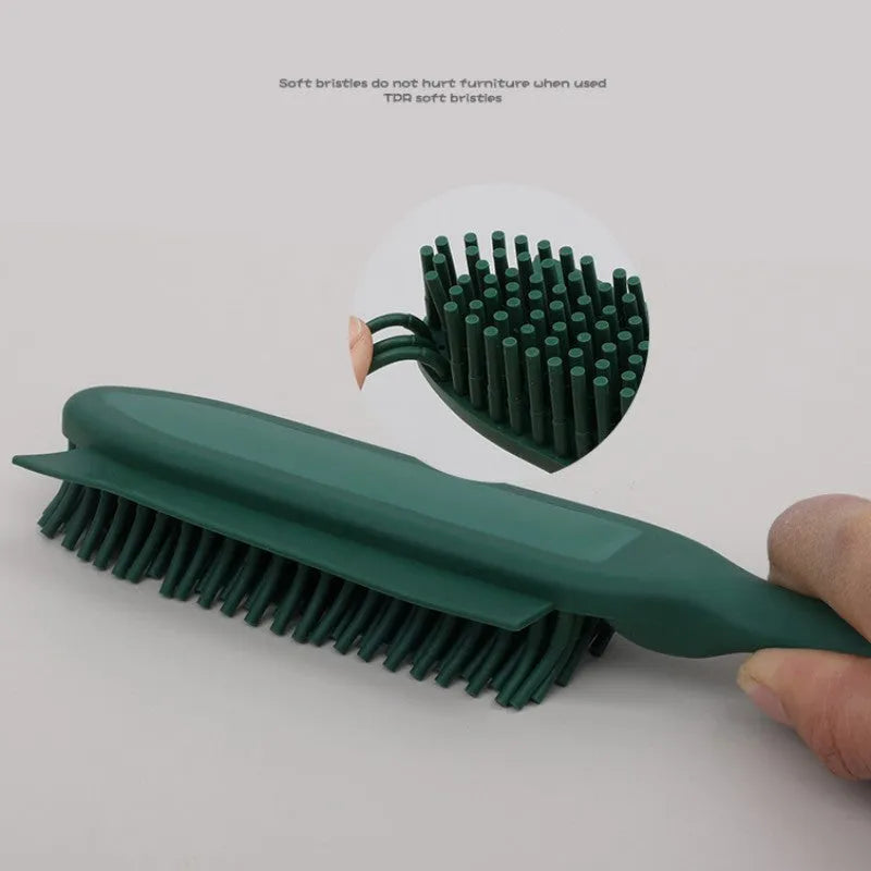 Green dog brush with hair collector reservoir, massage nodules, and a separate pink wool sticker for pet hair removal