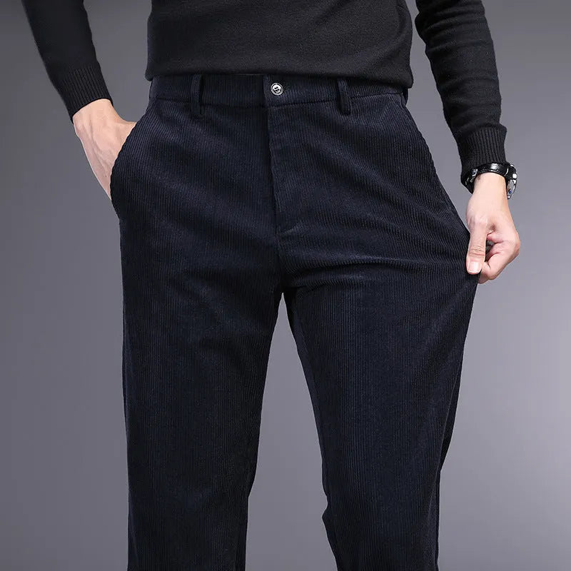 Straight-leg striped trousers in a khaki colour, showing the zip fly front and classic fit.