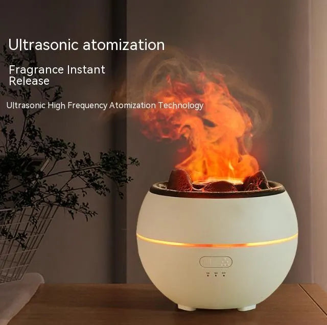 White round flame aroma diffuser humidifier with timer settings on a desk.
