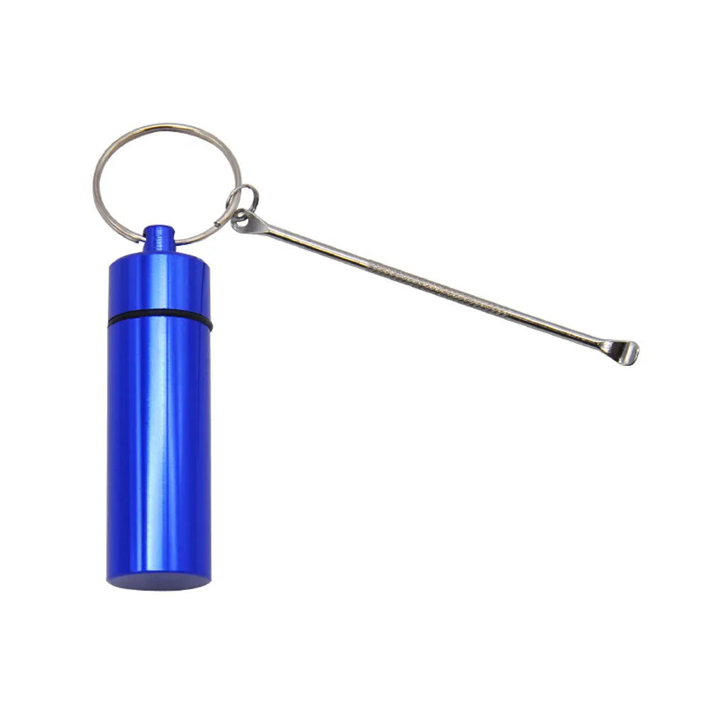 Blue aluminium portable medicine bottle with attached spoon and keychain for medication organisation