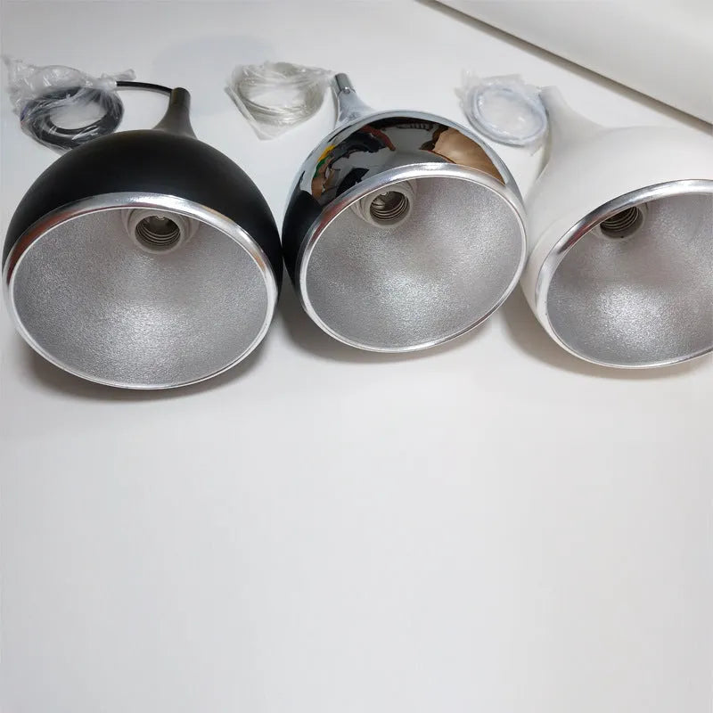 Minimalist iron chandelier pendant light in black finish with three bulb heads.