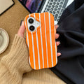 Colour-block striped film phone case showing orange and pink LQ5 wave stripe patterns on iPhone