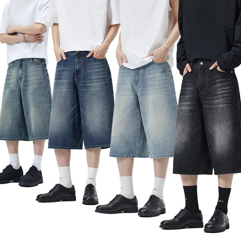 Men's loose straight denim shorts in light blue, cropped length, flat lay