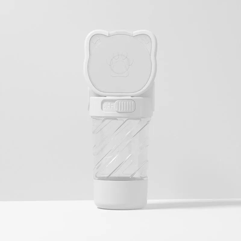 Green 3-in-1 pet water bottle with food container and waste bag dispenser, showing carrying strap.