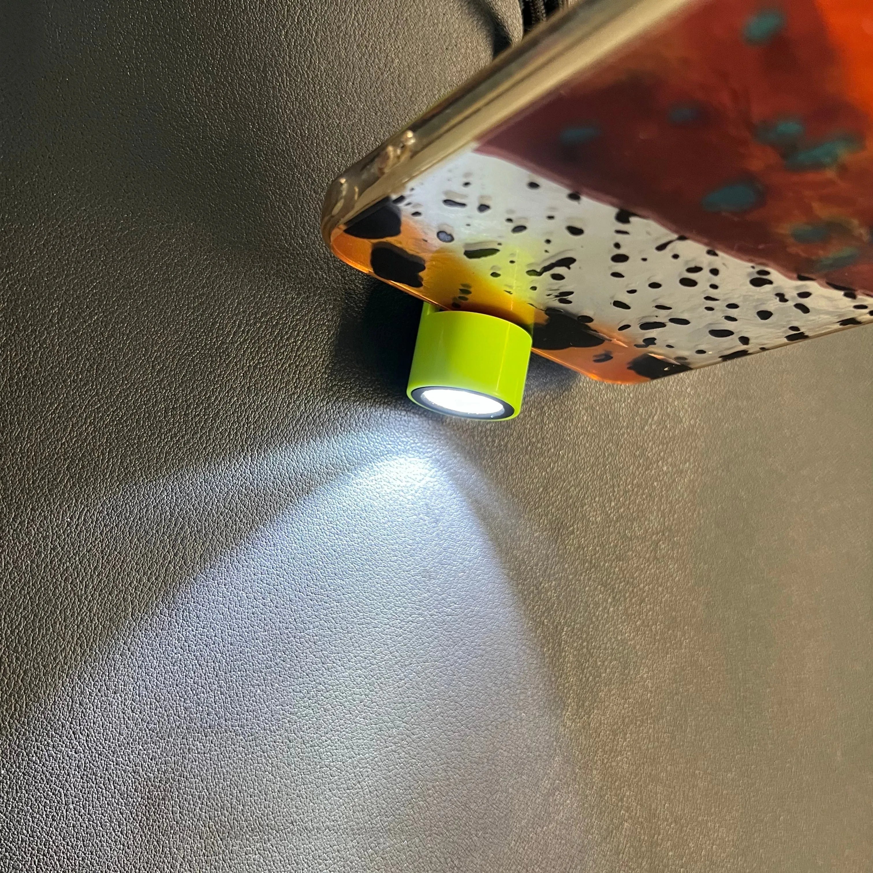 Green mobile phone mini torch with Type-C interface and LED light wick on a keychain