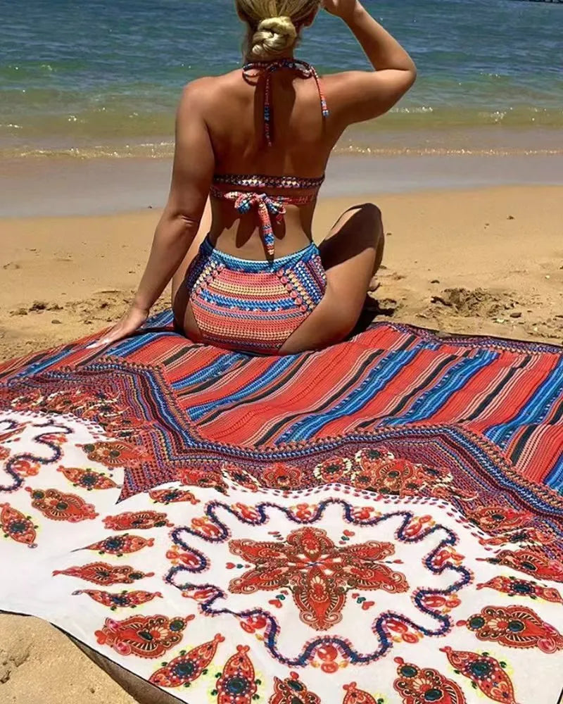 Women's three-piece swimsuit set showing high-waist briefs, sleeveless cutout top, and matching swim coat.