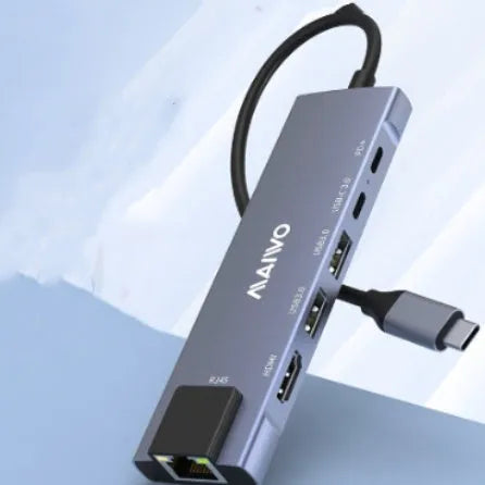 Steam Deck six-in-one docking station with aluminium shell showing Type-C, HDMI, ethernet, and USB ports