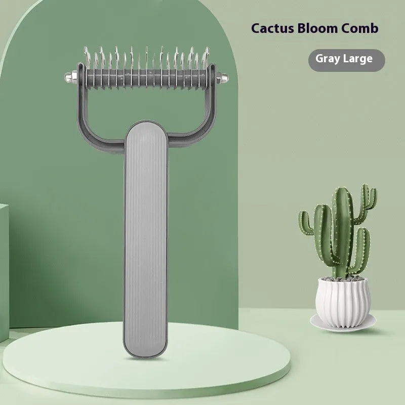 Green plastic and stainless steel dog detangling comb on a grey background.