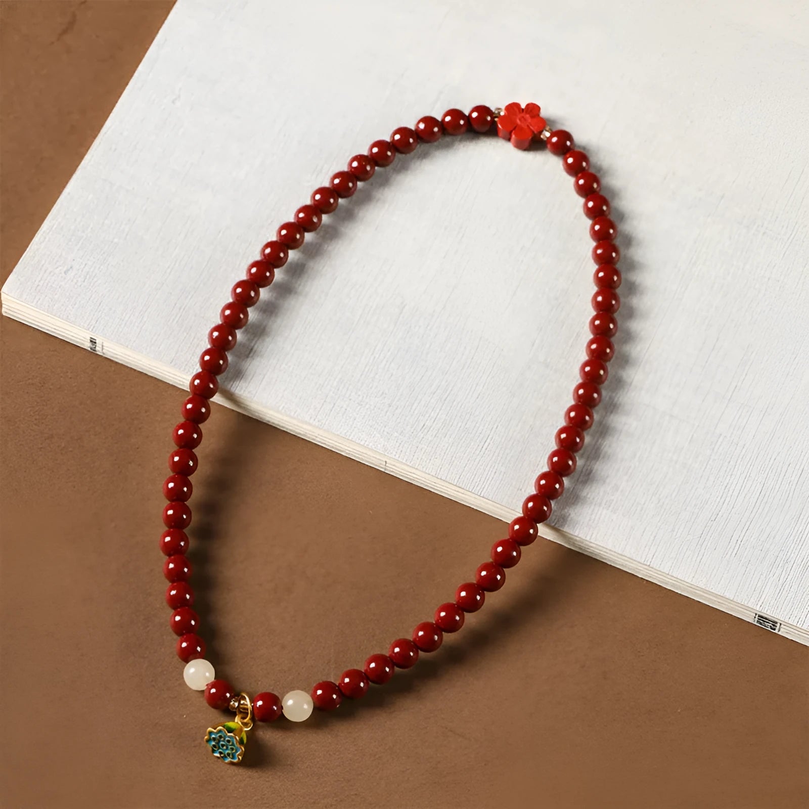 Purple gold cinnabar bead bracelet with lotus decoration and double circle design