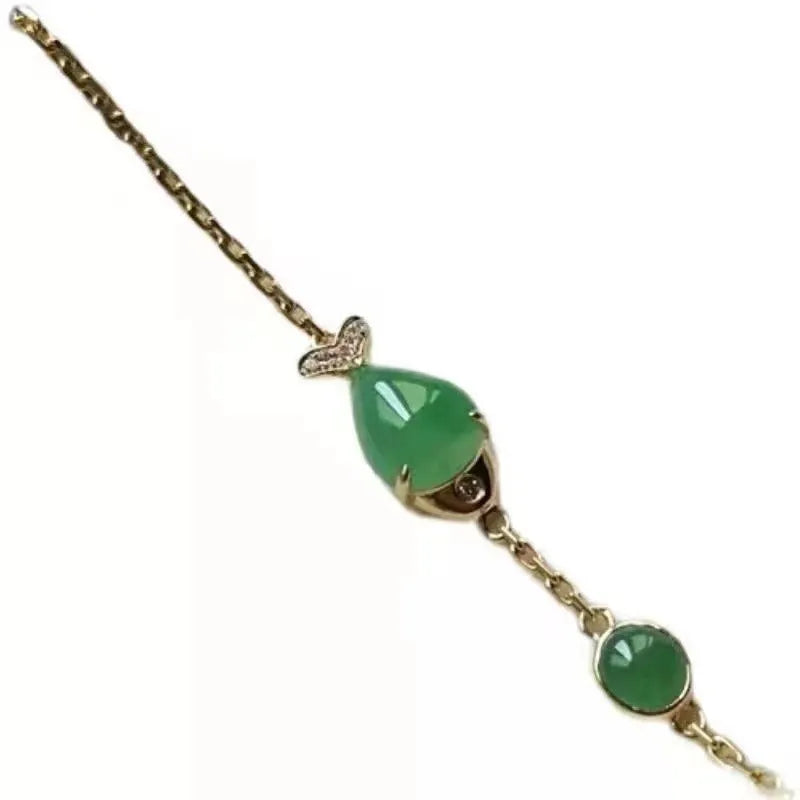 Yellow gold electroplated copper bracelet with plastic elements in retro style